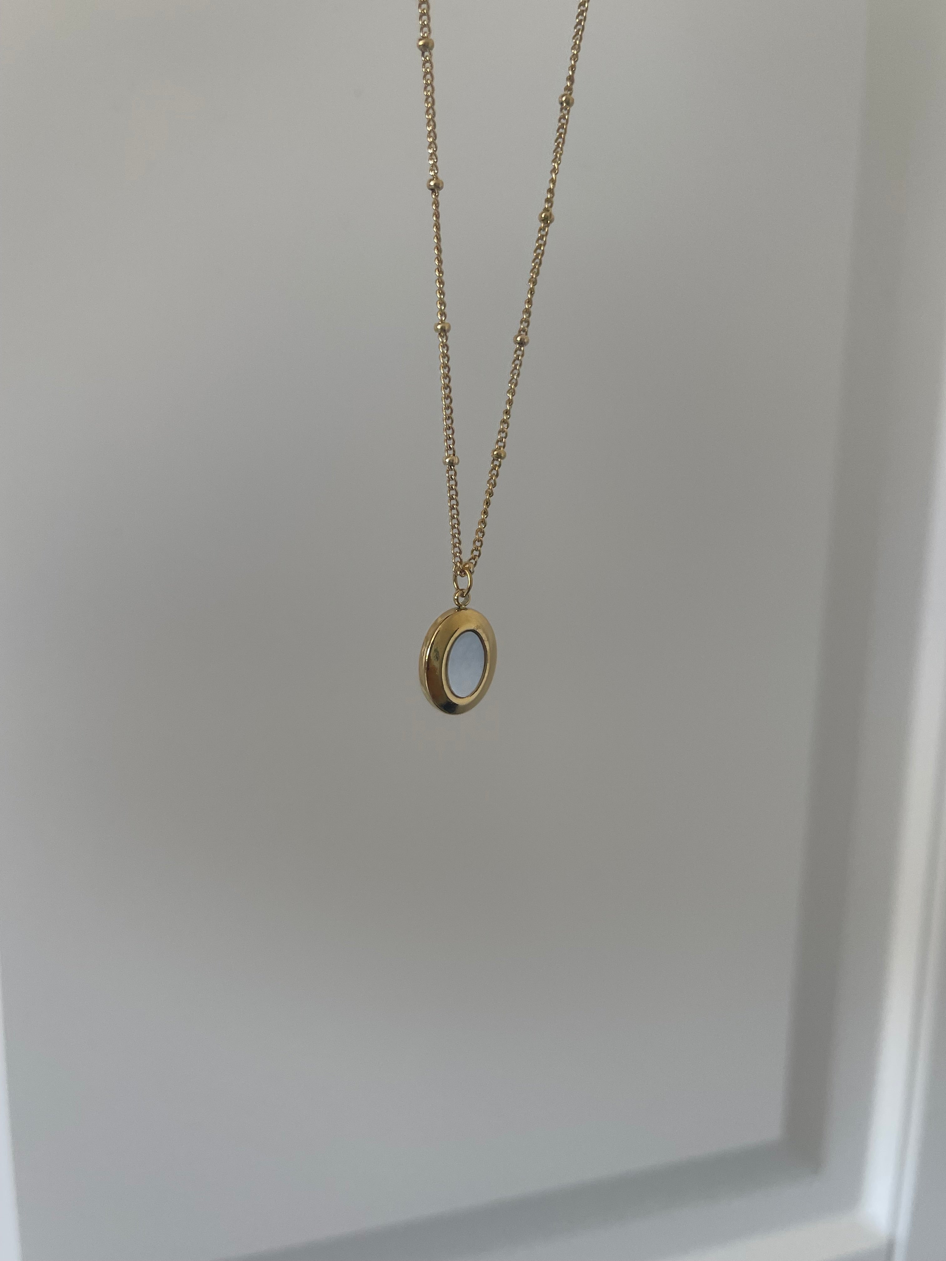 Çelik sedefli oval taş kolye