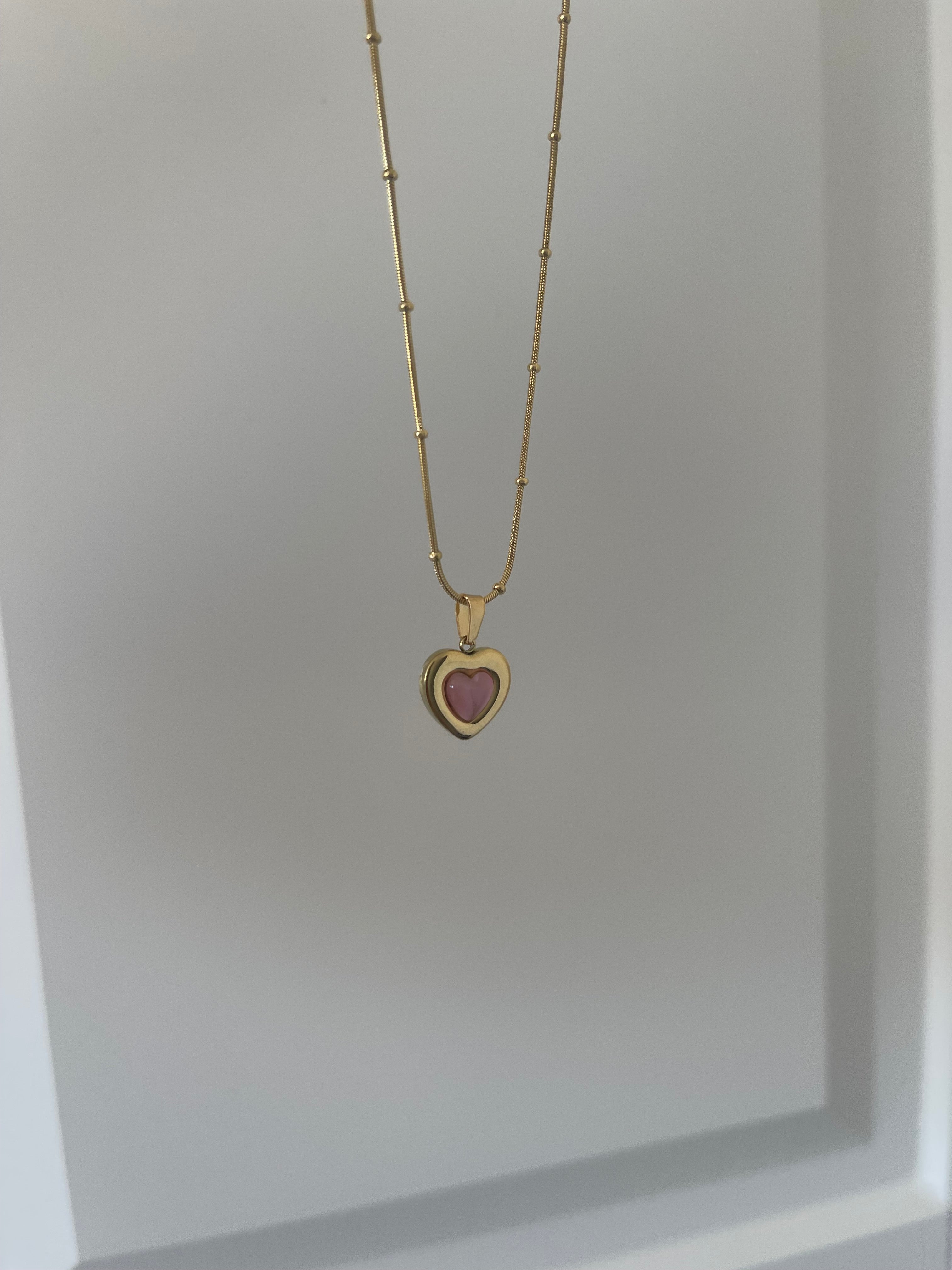 Çelik renkli kalp kolye