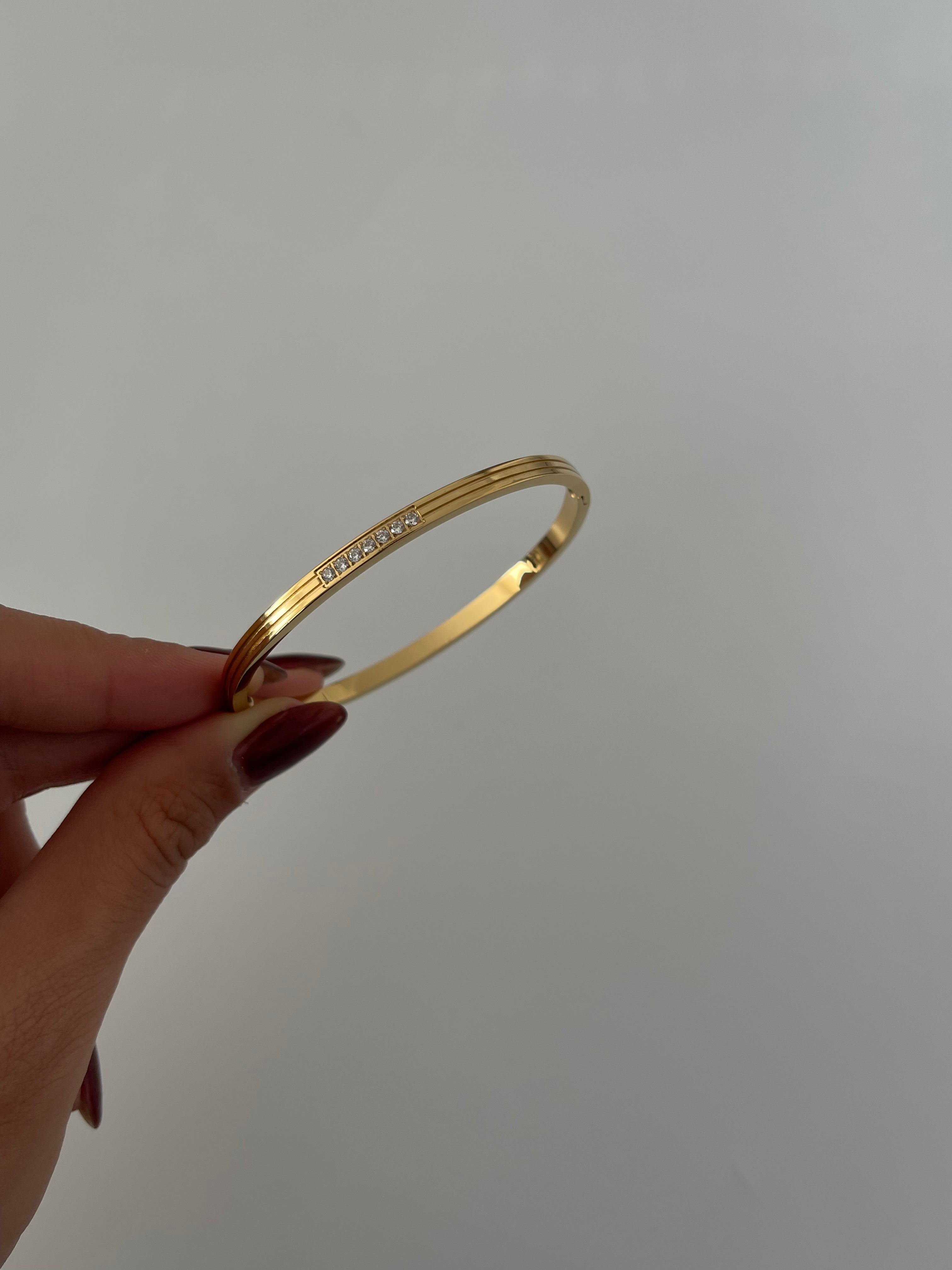 Çelik çizgili mini taş kelepçe