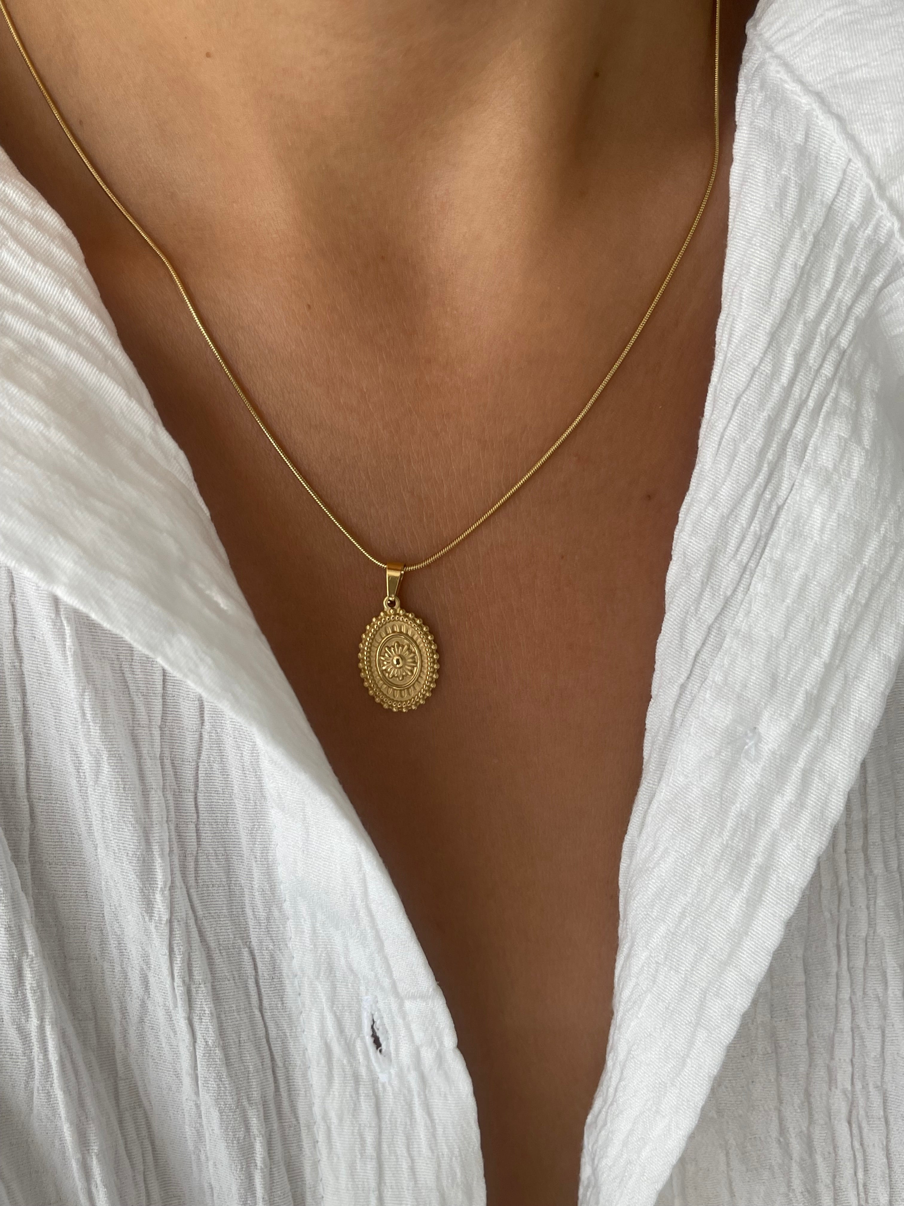 Çelik vintage motif kolye